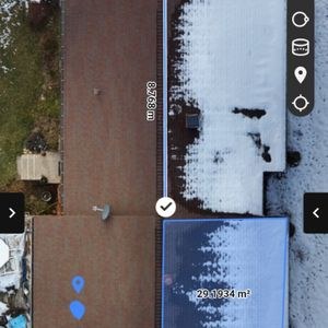 Overhead 2D drone map of a roof with one section measured at about 26 feet long and 314 square feet